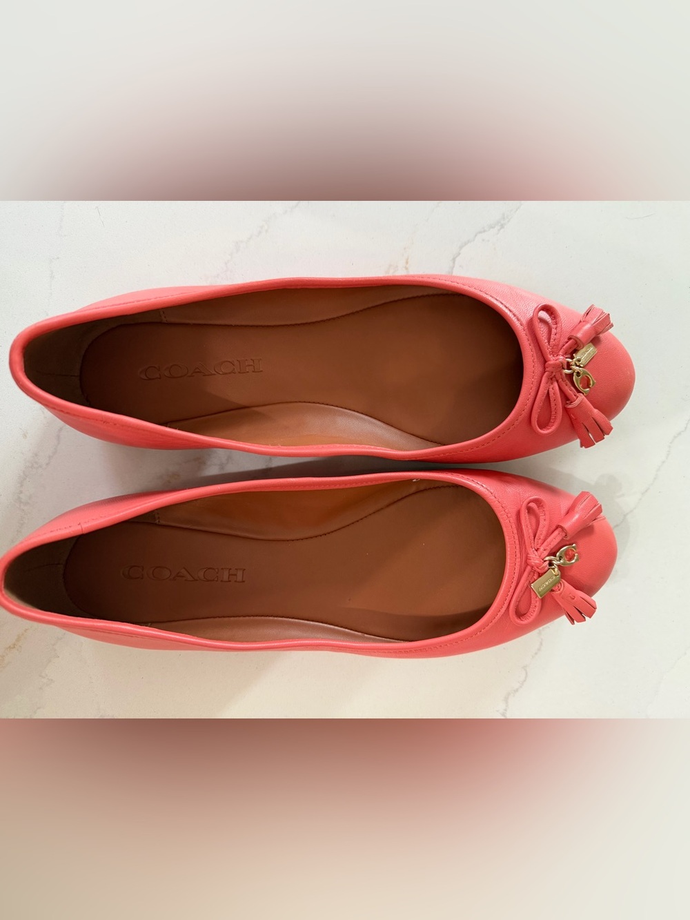 COACH Coral Pink Leather Ballet Flats with Tassel Bow